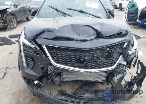 2022 Cadillac Xt4 Fwd Sport from USA, damaged, VIN 1GYFZER46NF143522